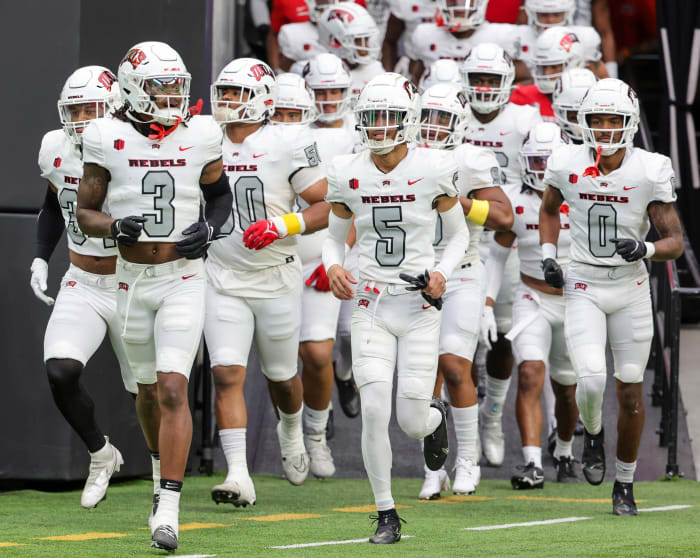 LAS VEGAS, NEVADA - APRIL 08 UNLV Rebels runs onto the field before the team's spring showcase scrimmage at Allegiant Stadium on April 08, 2023 in Las Vegas, Nevada. (Photo by Ethan Miller/Getty Images)